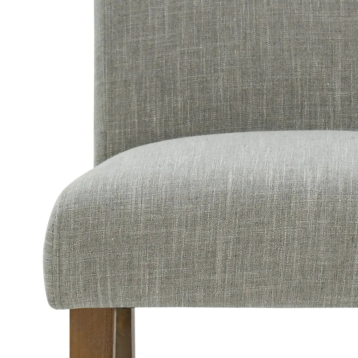 Gray fabric North Upholstered Dining Chair, wooden legs, close-up view, elegant dining room furniture.