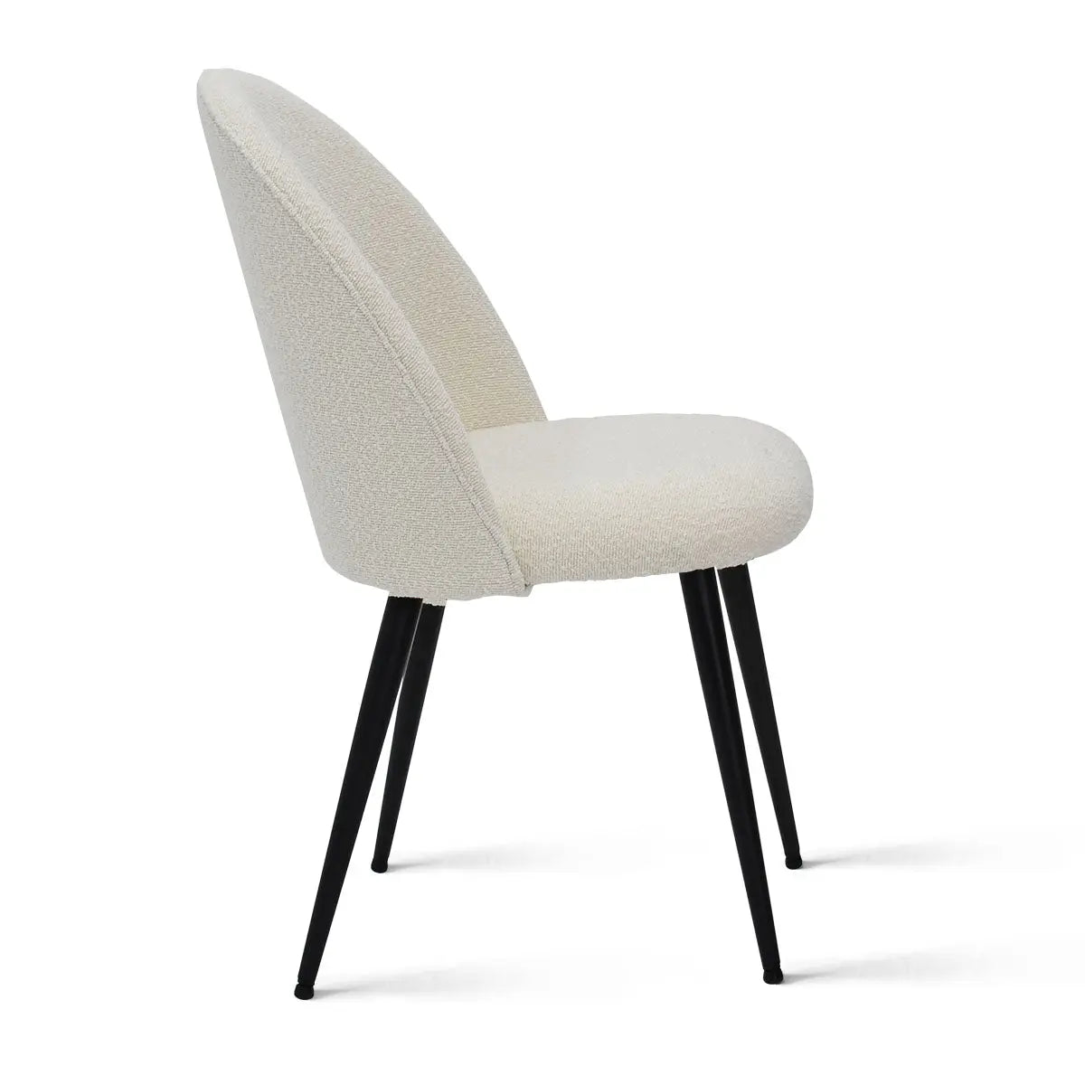 Rhon Modern Boucle Dining Chair with black legs, side view, in a minimalist setting.