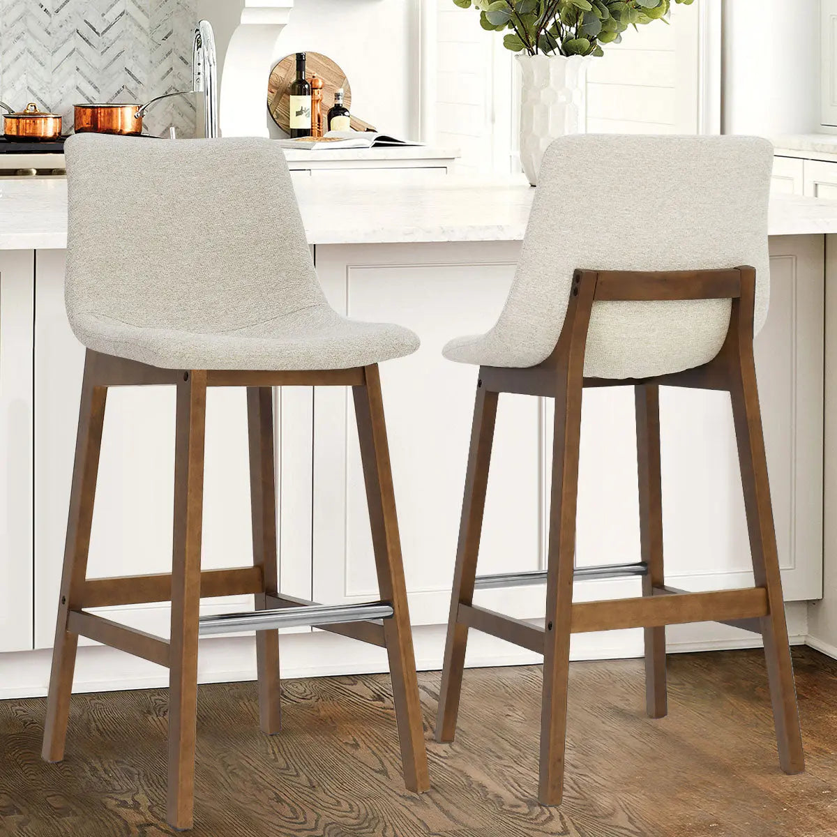 South 28.5" Modern Upholstered Counter Stool set in kitchen with white cabinets, wood flooring.