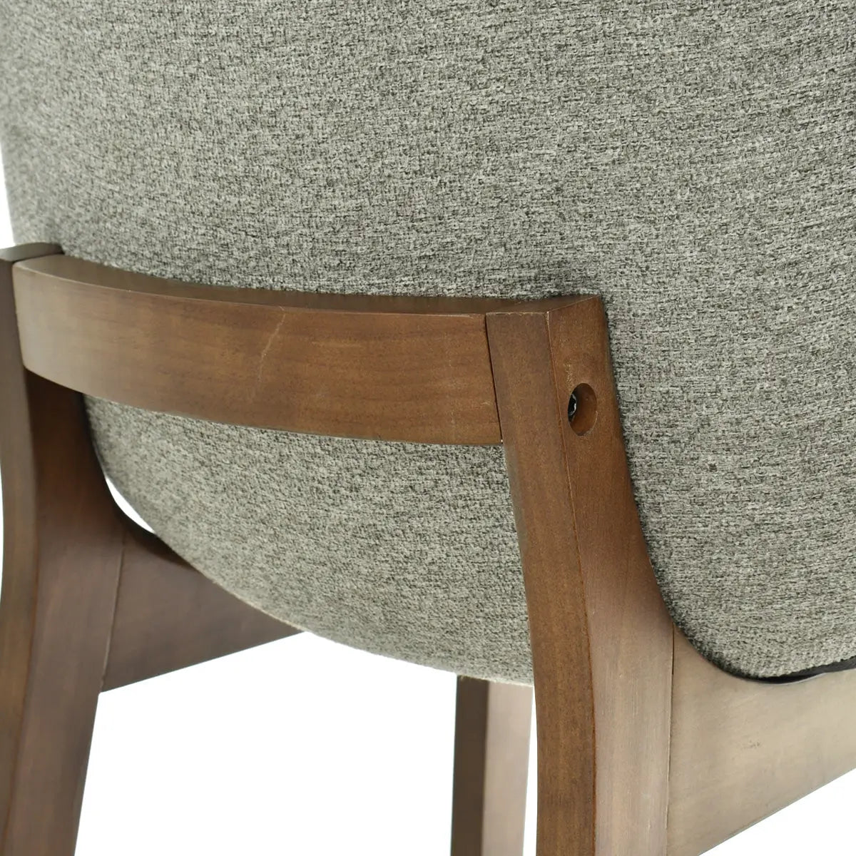 Close-up of South Modern Upholstered Counter Stool with wooden frame and gray fabric.