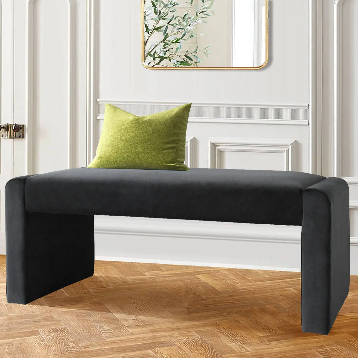 Kaia Modern Leather & Velvet Waterfall Bench in elegant room with wood flooring and panel walls.